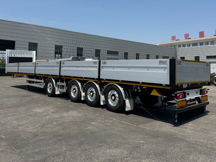 Heavy Duty Side Wall Trailer navigating rough terrain